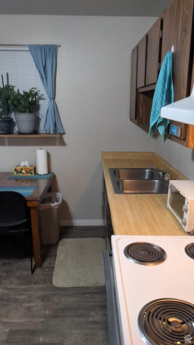 7923 S Main St W Unit 11, Midvale, UT 84047 - kitchen with white electric range, a sink, baseboards, dark wood-style floors, and an office area