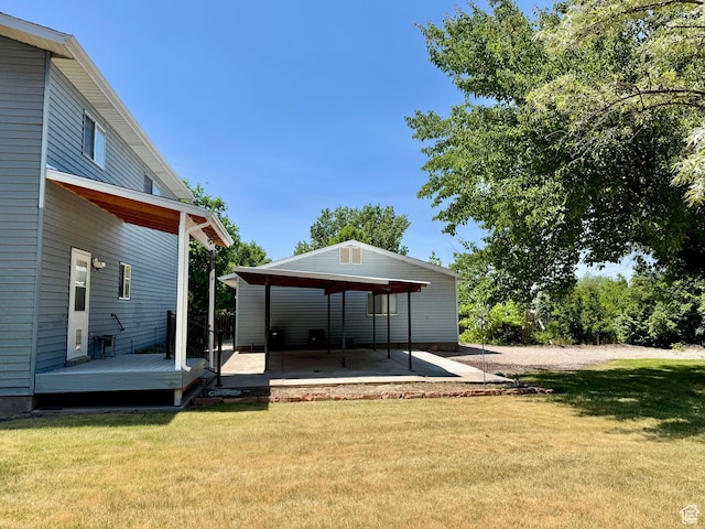 160 W 100 S, Fillmore, UT 84631 - view of green lawn with a deck and a patio area