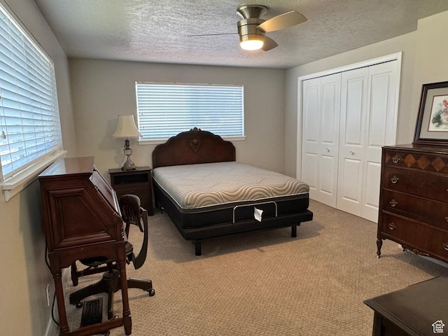 160 W 100 S, Fillmore, UT 84631 - bedroom featuring a closet, carpet flooring, a ceiling fan, and a textured ceiling