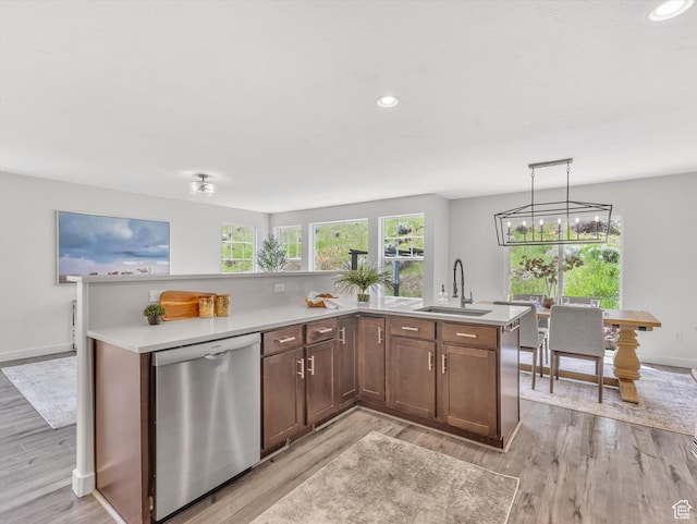 2286 E Deer Park Ln, Draper, UT 84020 - kitchen featuring stainless steel dishwasher, a sink, light wood-style flooring, light countertops, and recessed lighting