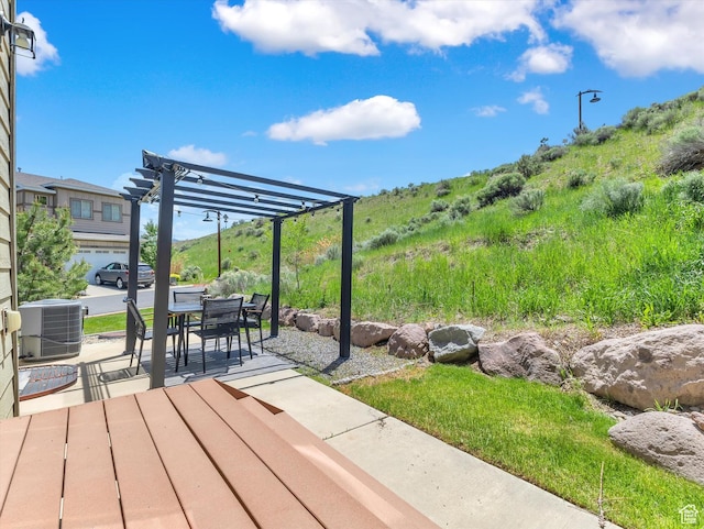 2286 E Deer Park Ln, Draper, UT 84020 - wooden terrace with central air condition unit, a pergola, a patio area, and outdoor dining space
