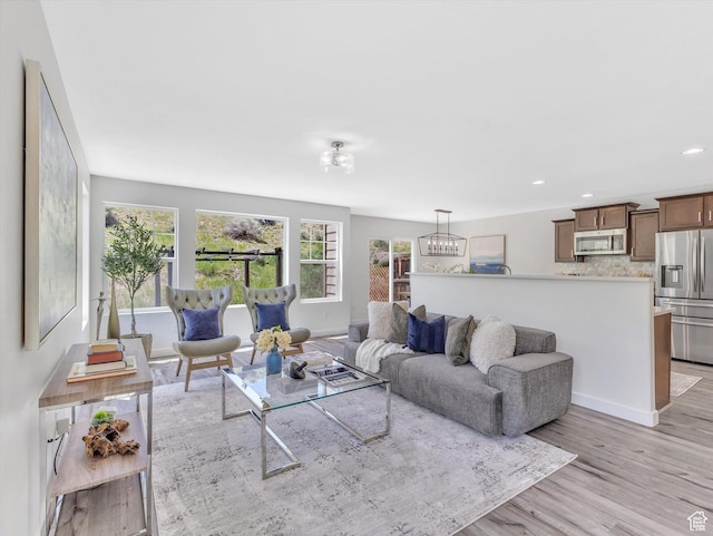 2286 E Deer Park Ln, Draper, UT 84020 - living room featuring light wood-style floors, recessed lighting, and baseboards