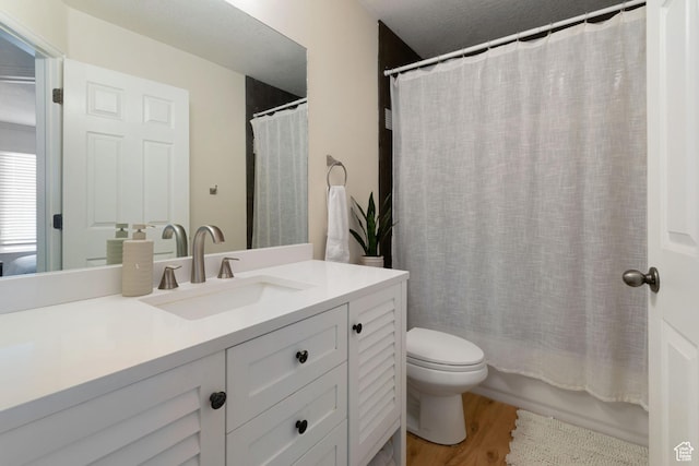 1559 W Alsace Way, West Valley City, UT 84119 - full bathroom featuring vanity, toilet, wood finished floors, and shower / bath combo
