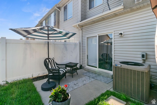 1559 W Alsace Way, West Valley City, UT 84119 - view of patio with central AC
