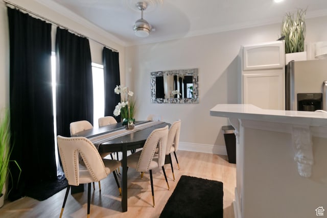 1559 W Alsace Way, West Valley City, UT 84119 - dining room with ornamental molding, light wood-type flooring, and baseboards