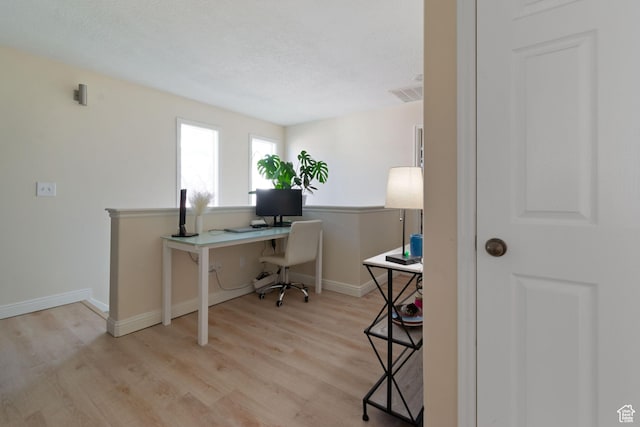 1559 W Alsace Way, West Valley City, UT 84119 - office space featuring wood finished floors, baseboards, and a textured ceiling