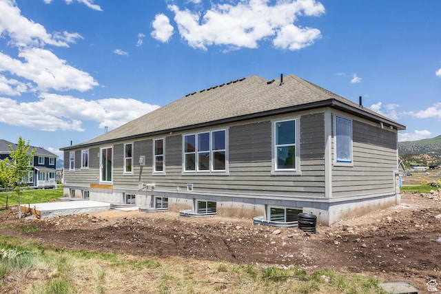 1928 E 540 S Unit 64, Heber City, UT 84032 - rear view of property featuring a patio and a shingled roof