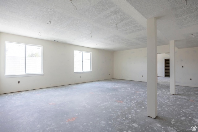 1928 E 540 S Unit 64, Heber City, UT 84032 - unfurnished room with a textured ceiling and concrete flooring