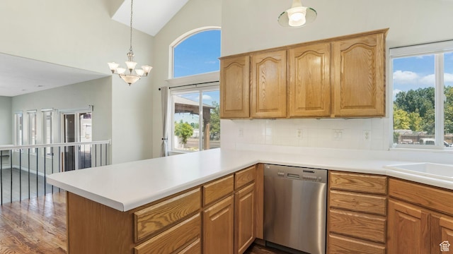 9677 S Iron Gate Rd, South Jordan, UT 84095 - kitchen featuring dishwasher, dark wood-style floors, a chandelier, tasteful backsplash, and high vaulted ceiling