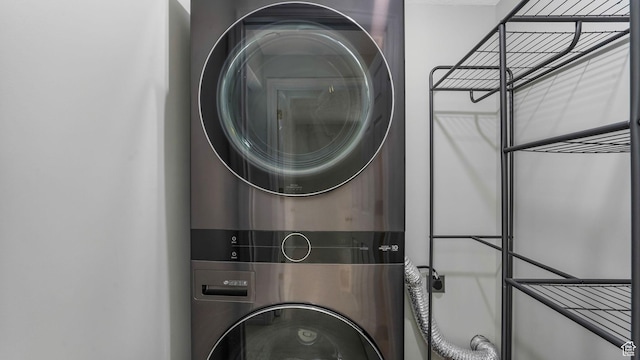 9677 S Iron Gate Rd, South Jordan, UT 84095 - washroom with stacked washer and clothes dryer