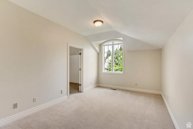 4234 N Vintage Cir, Provo, UT 84604 - unfurnished bedroom featuring light colored carpet, lofted ceiling, and baseboards