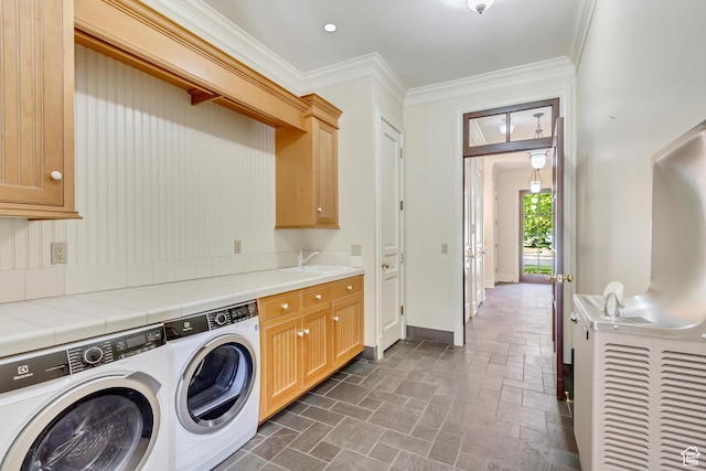 4234 N Vintage Cir, Provo, UT 84604 - laundry room with washer and dryer, cabinet space, stone tile floors, crown molding, and baseboards