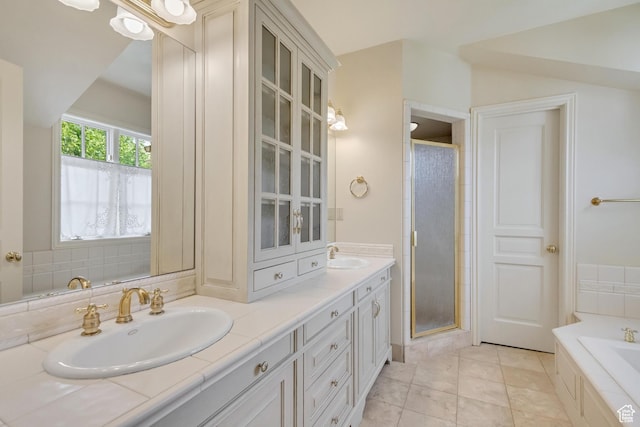4234 N Vintage Cir, Provo, UT 84604 - full bath with double vanity, a stall shower, a garden tub, and tile patterned floors
