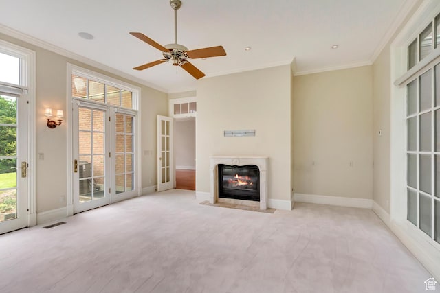 4234 N Vintage Cir, Provo, UT 84604 - unfurnished living room with french doors, crown molding, a fireplace, plenty of natural light, and baseboards