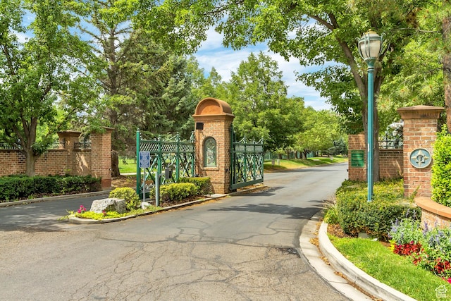 4234 N Vintage Cir, Provo, UT 84604 - view of asphalt road with curbs and street lights
