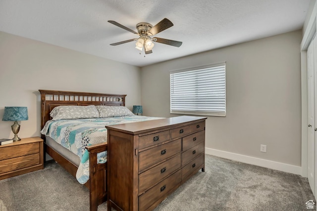 4060 W 4950 S, Roy, UT 84067 - bedroom with light colored carpet, baseboards, and a ceiling fan
