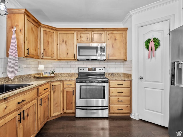 518 S 2150 W Unit 202, Pleasant Grove, UT 84062 - kitchen with appliances with stainless steel finishes, backsplash, light stone counters, dark wood-type flooring, and crown molding