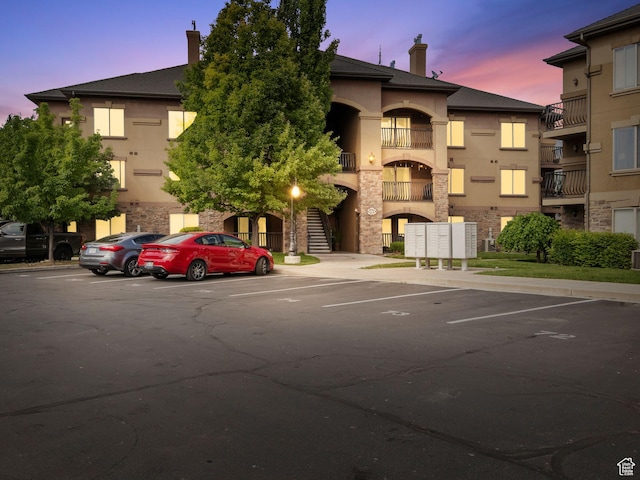 518 S 2150 W Unit 202, Pleasant Grove, UT 84062 - property at dusk with uncovered parking