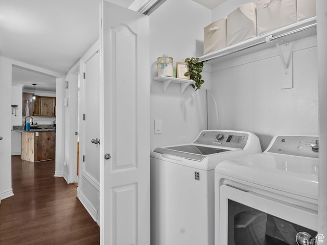 518 S 2150 W Unit 202, Pleasant Grove, UT 84062 - laundry room featuring washing machine and clothes dryer and dark wood-style flooring