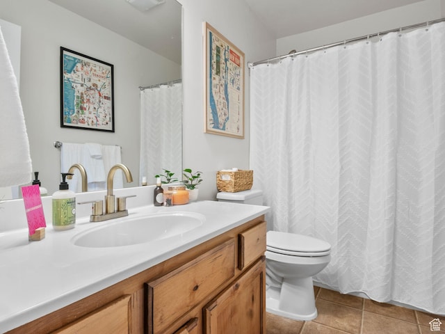 518 S 2150 W Unit 202, Pleasant Grove, UT 84062 - bathroom featuring vanity, toilet, and tile patterned flooring