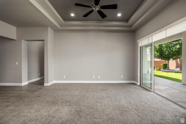 1861 N Mountain View Dr, Washington, UT 84780 - carpeted spare room with a ceiling fan, a raised ceiling, baseboards, and recessed lighting