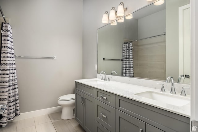 1861 N Mountain View Dr, Washington, UT 84780 - full bathroom featuring toilet, double vanity, baseboards, and curtained shower