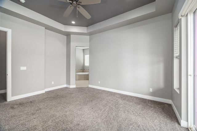 1861 N Mountain View Dr, Washington, UT 84780 - carpeted spare room featuring ceiling fan, a tray ceiling, baseboards, and recessed lighting