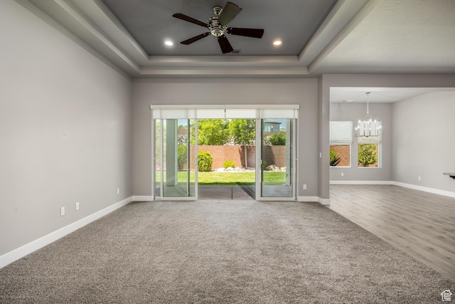 1861 N Mountain View Dr, Washington, UT 84780 - carpeted spare room featuring a chandelier, baseboards, ceiling fan, a raised ceiling, and recessed lighting
