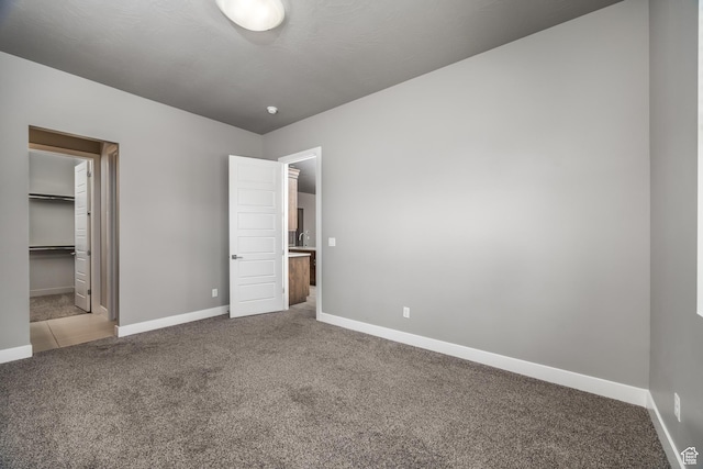 1861 N Mountain View Dr, Washington, UT 84780 - unfurnished bedroom featuring carpet and baseboards