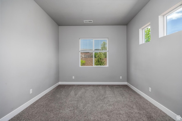 1861 N Mountain View Dr, Washington, UT 84780 - spare room featuring carpet and baseboards