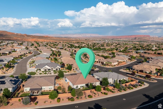 1861 N Mountain View Dr, Washington, UT 84780 - aerial view of property and surrounding area featuring a mountain backdrop and nearby suburban area