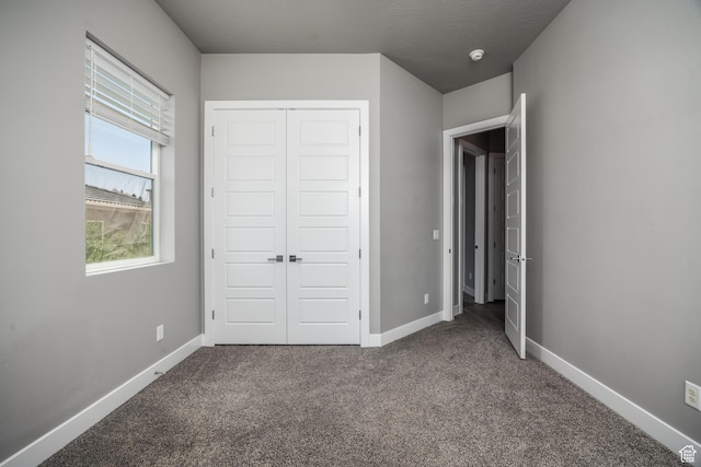 1861 N Mountain View Dr, Washington, UT 84780 - unfurnished bedroom with carpet, a closet, and baseboards