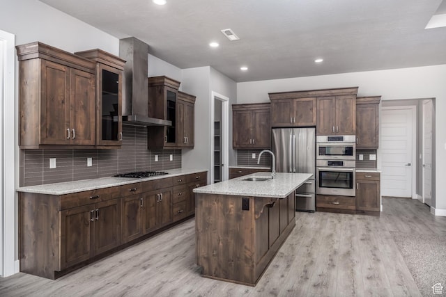 1861 N Mountain View Dr, Washington, UT 84780 - kitchen with range hood, stainless steel appliances, light wood-type flooring, a sink, and recessed lighting
