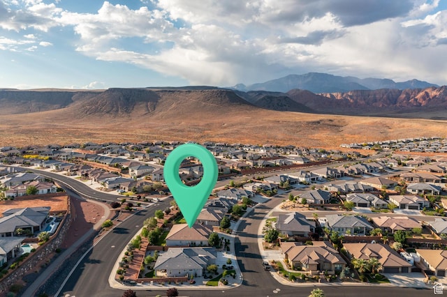 1861 N Mountain View Dr, Washington, UT 84780 - aerial view of property and surrounding area with nearby suburban area and a mountain backdrop