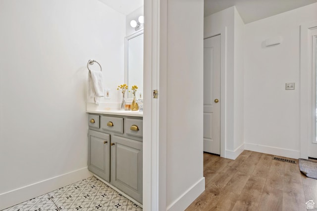 960 N E View Dr, Alpine, UT 84004 - bathroom featuring baseboards, vanity, and wood finished floors