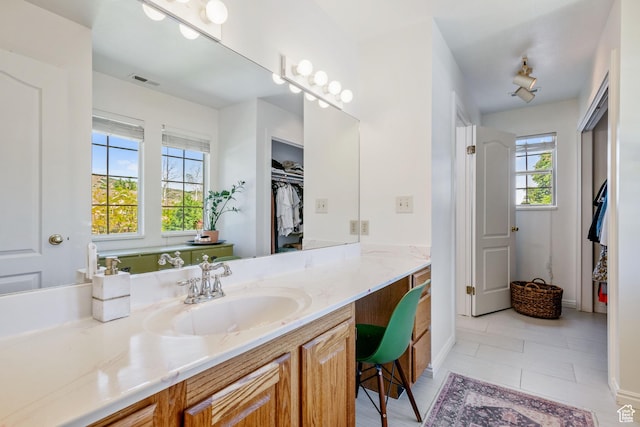 960 N E View Dr, Alpine, UT 84004 - bathroom with vanity, tile patterned floors, and a walk in closet