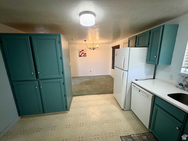 391 N 100 W, Delta, UT 84624 - kitchen featuring white appliances, green cabinetry, light flooring, a chandelier, and light countertops