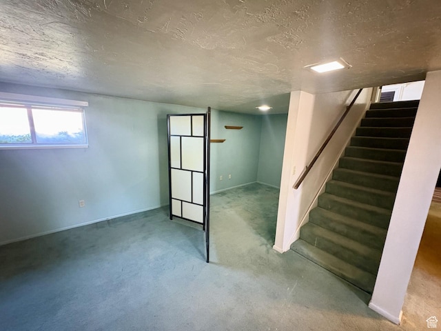 391 N 100 W, Delta, UT 84624 - basement with stairway, carpet flooring, a textured ceiling, and baseboards