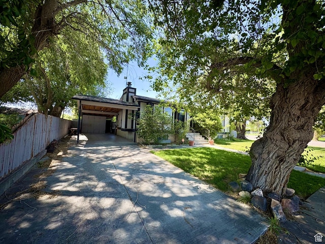 391 N 100 W, Delta, UT 84624 - view of front of home featuring driveway and a chimney