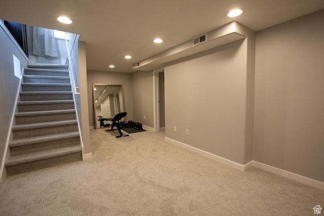 1438 E Woodland Ave S, Millcreek, UT 84106 - finished basement featuring light colored carpet, recessed lighting, and stairway