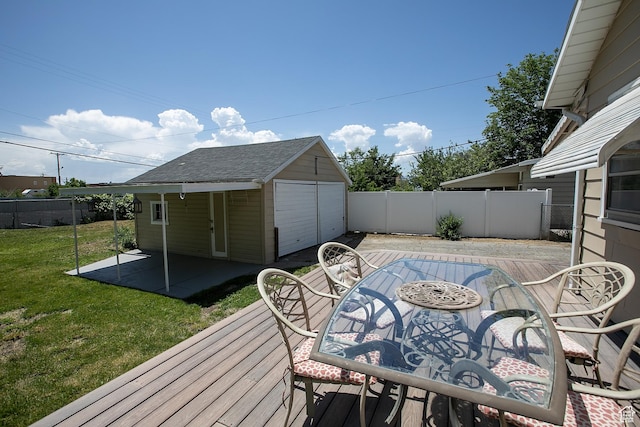 1438 E Woodland Ave S, Millcreek, UT 84106 - wooden terrace featuring a fenced backyard, a garage, an outbuilding, and a patio