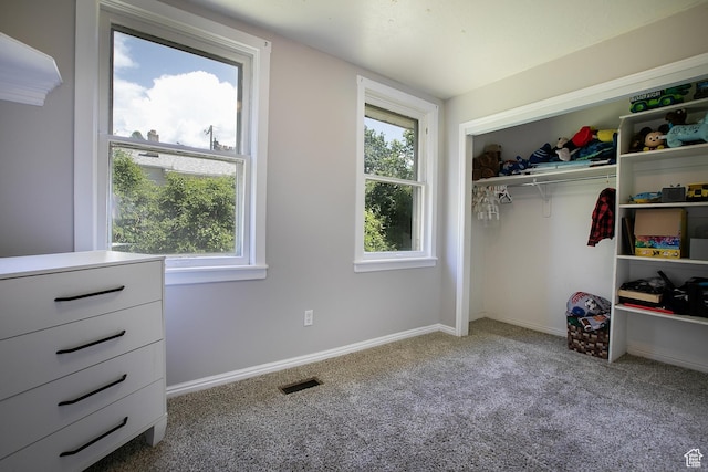1438 E Woodland Ave S, Millcreek, UT 84106 - bedroom with carpet flooring and a closet