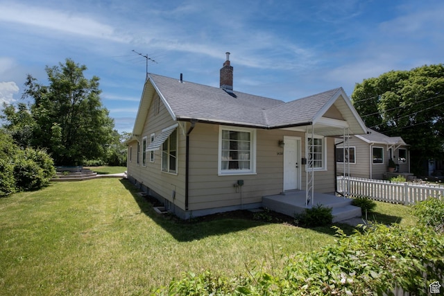 1438 E Woodland Ave S, Millcreek, UT 84106 - bungalow-style home featuring a chimney and roof with shingles