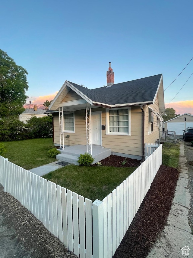1438 E Woodland Ave S, Millcreek, UT 84106 - bungalow featuring a porch and a chimney