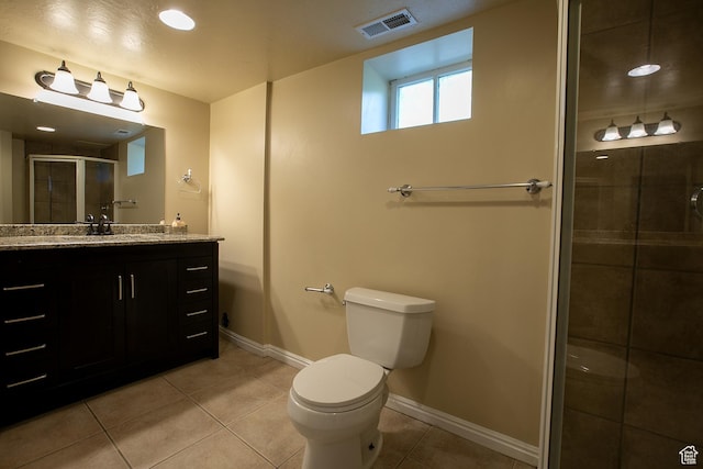 1438 E Woodland Ave S, Millcreek, UT 84106 - full bathroom with vanity, a stall shower, and tile patterned floors