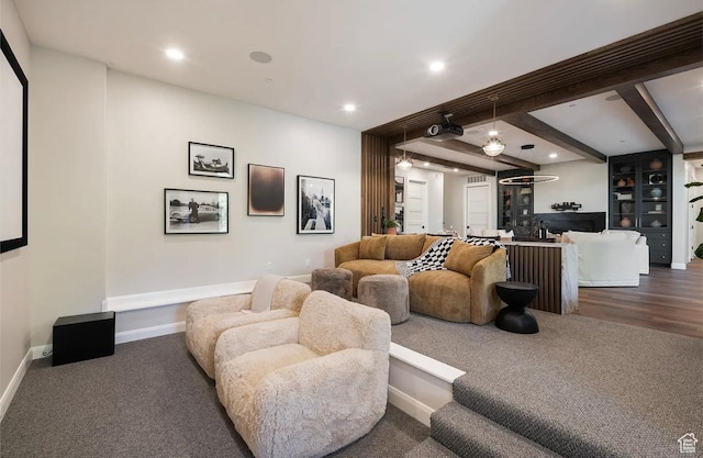 1040 S Summit Creek Dr, Woodland Hills, UT 84653 - living area with dark carpet, beam ceiling, recessed lighting, and baseboards