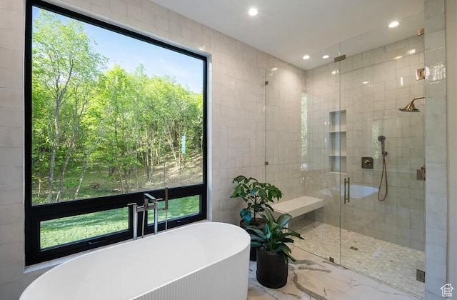 1040 S Summit Creek Dr, Woodland Hills, UT 84653 - bathroom featuring a freestanding bath, a stall shower, recessed lighting, and marble finish floors