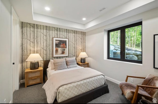 1040 S Summit Creek Dr, Woodland Hills, UT 84653 - carpeted bedroom with baseboards, recessed lighting, a tray ceiling, and an accent wall