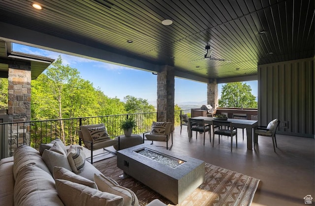 1040 S Summit Creek Dr, Woodland Hills, UT 84653 - view of patio featuring an outdoor living space with a fire pit and outdoor dining area