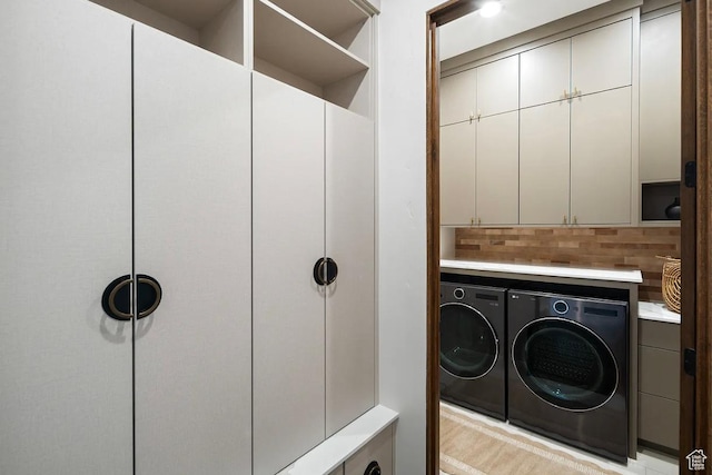 1040 S Summit Creek Dr, Woodland Hills, UT 84653 - laundry room featuring separate washer and dryer and cabinet space